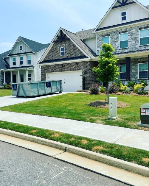 10 Cubic Yard Dumpster Rental in Front of a House