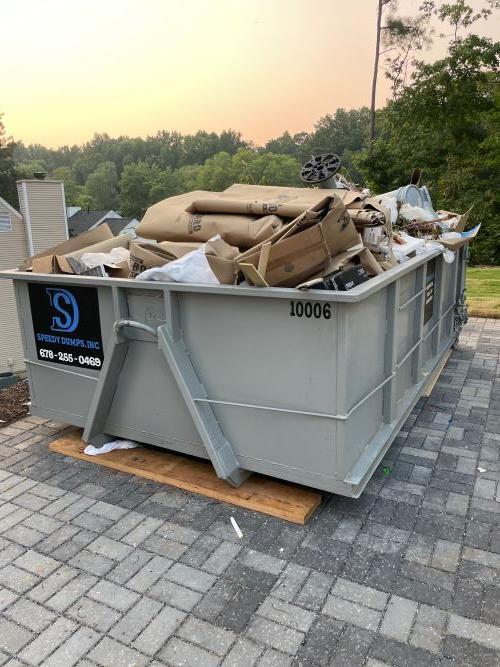 10 Yard Dumpster Rental Filled With Cartons